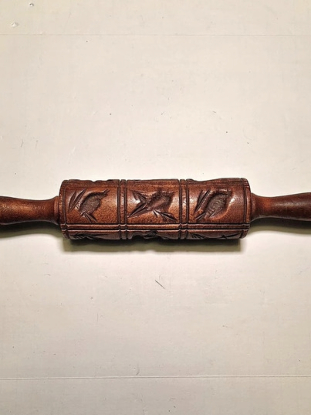 Carved Wooden Rolling Pin in Brown